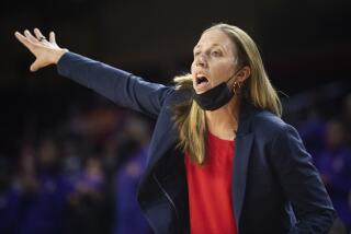 Southern California head coach Lindsay Gottlieb gives instructions to her players during an NCAA basketball game against Hawaii on Thursday, Nov.11 2021, in Los Angeles. (AP Photo/Kyusung Gong)
