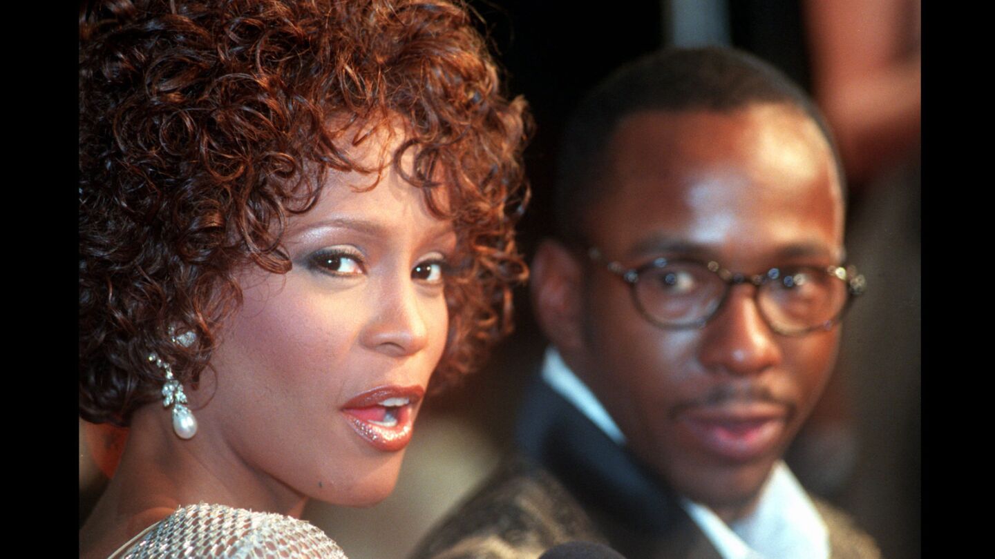 Whitney Houston and then-husband Bobbi Brown at a premiere at Mann's Chinese Theater in Hollywood.