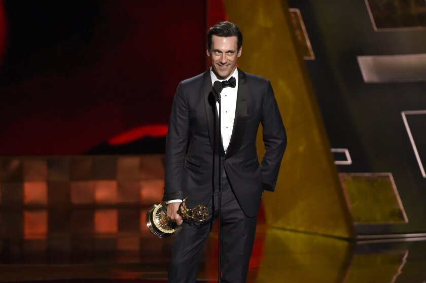 Jon Hamm accepts the Emmy award for lead actor in a drama series for "Mad Men."
