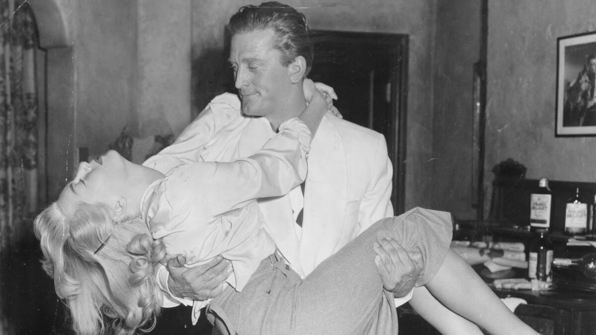 Lana Turner and Kirk Douglas in MGM's "The Bad and the Beautiful." (File Photo)