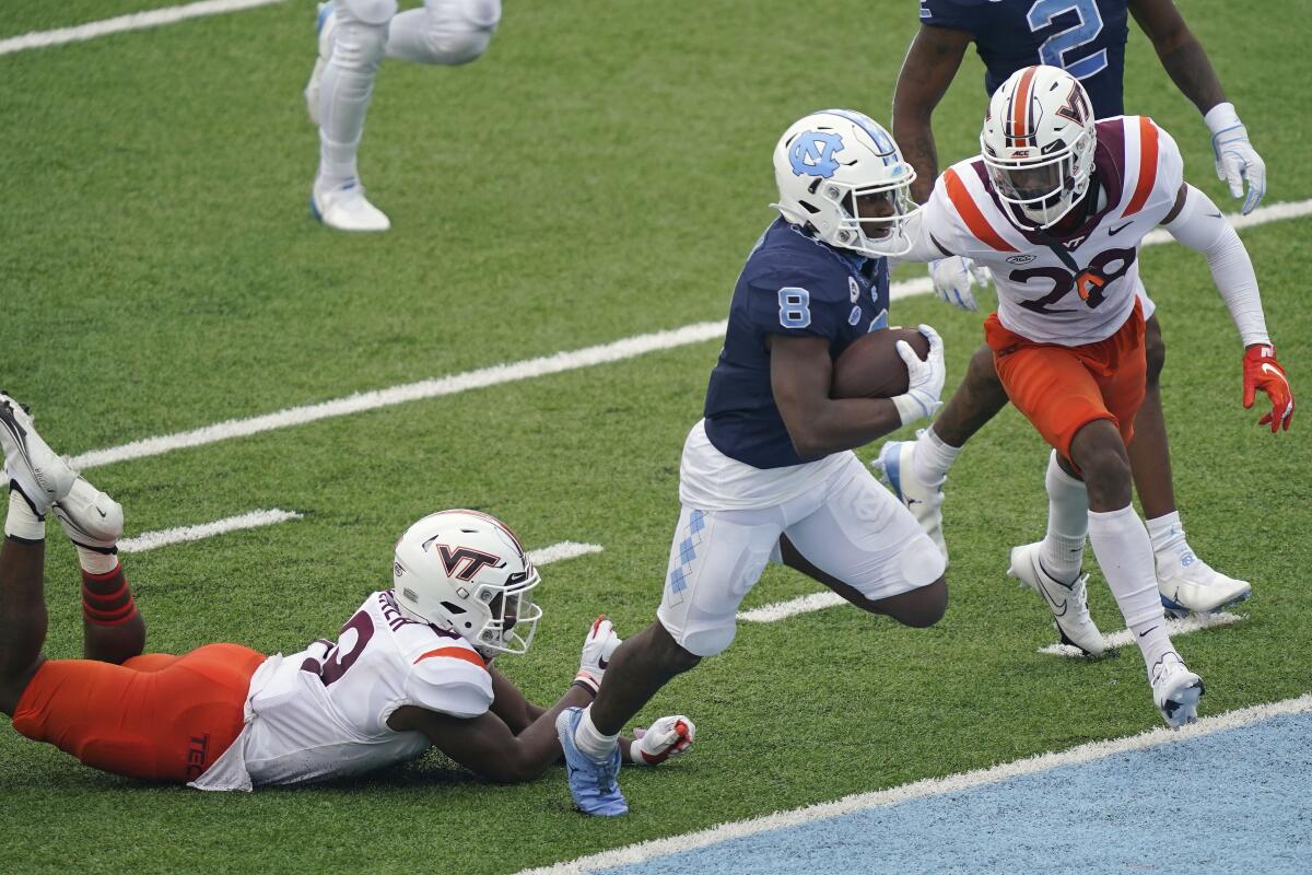 North Carolina running back Michael Carter scores a touchdown against Virginia Tech.