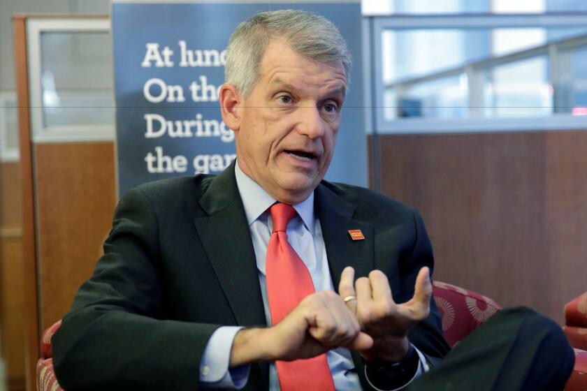 Wells Fargo CEO & President Timothy Sloan is interviewed in one of his bank's branches, in New York, Friday, March 17, 2017. Sloan said that it's too early to gauge President Trump's job performance, but says that he will succeed as long as the White House focuses on jobs and economic growth. (AP Photo/Richard Drew)