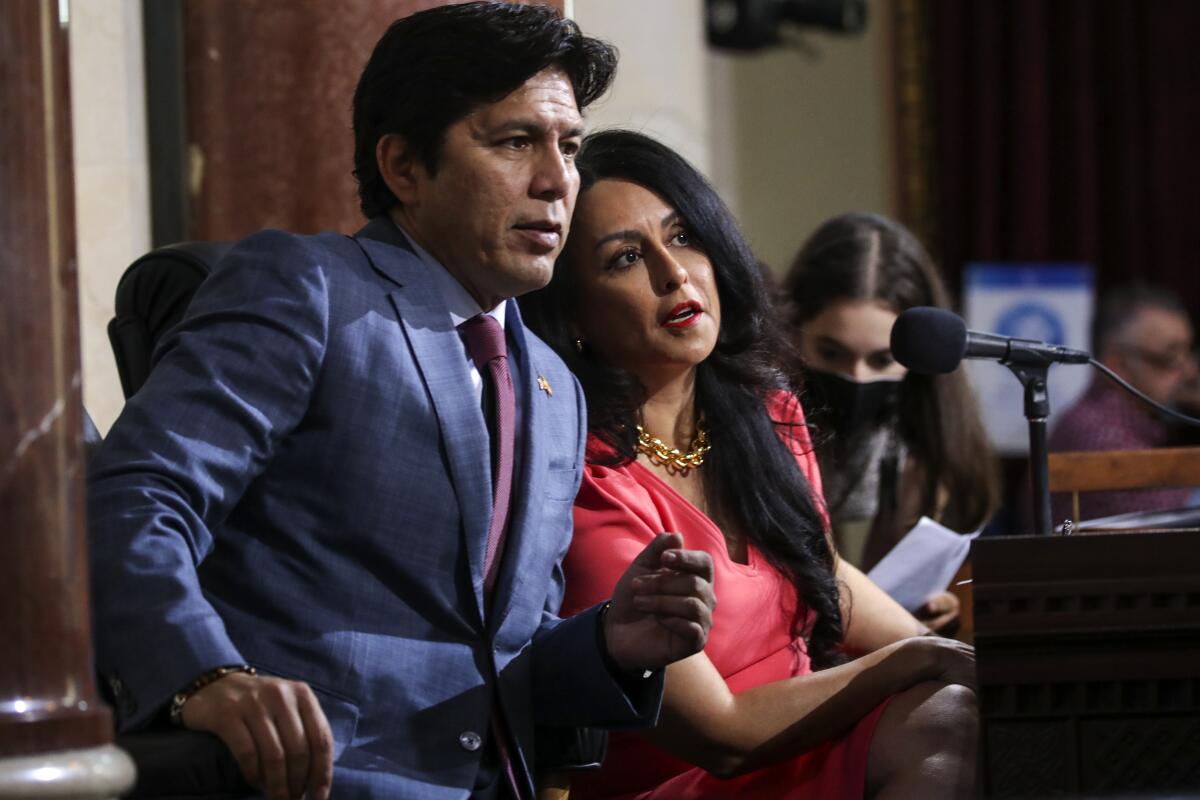 Photo of councilman Kevin de Leon, left, and former Los Angeles City Council President Nury Martinez at city council meeting