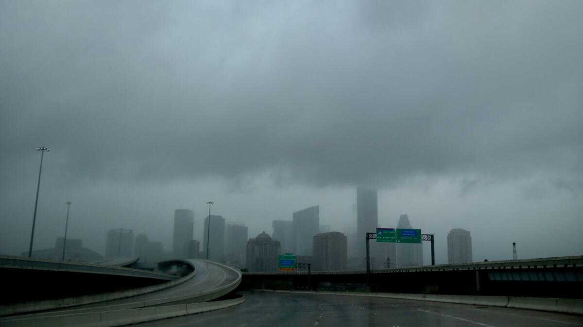 Rain clouds over downtown Houston on Aug. 27, 2017.