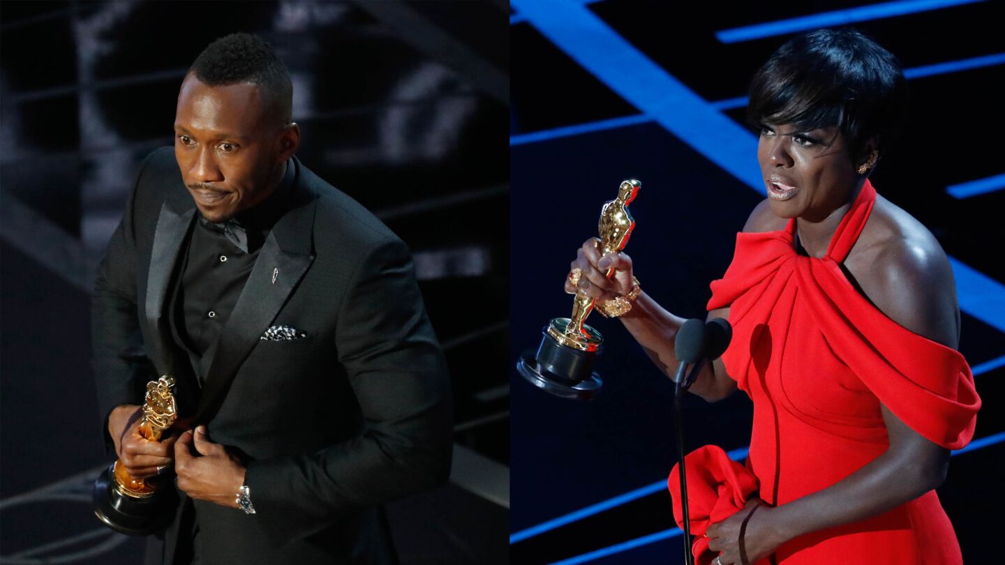 Mahershala Ali, left, and Viola Davis, winners for best supporting actor and actress.