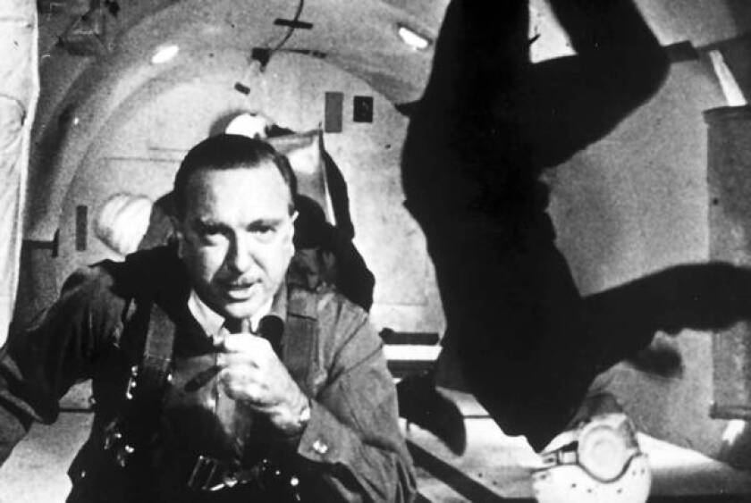 Walter Cronkite in a reduced-gravity environment in 1964.
