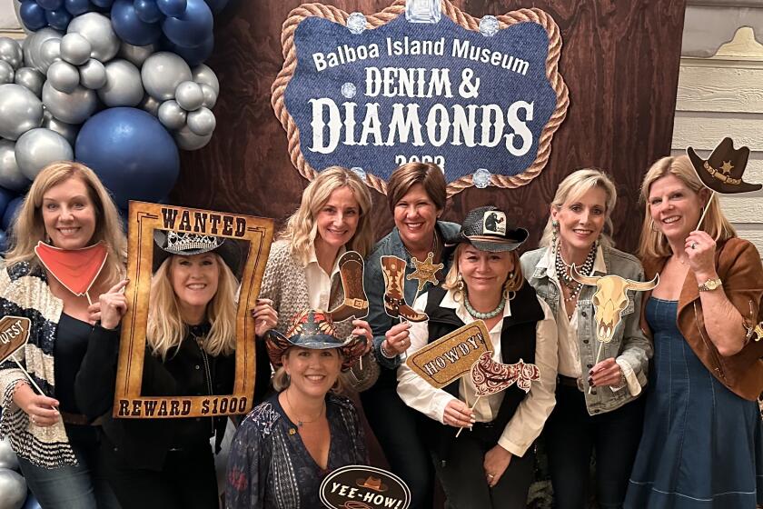 Kathy Belsby, Keri Dugan, Danielle Rivas, Tiffany Viale, Renee Pepys Lowe, Kim Day, RexAnn Hill and Molly Davin, all front and center on Nov. 17 for Denim & Diamonds 2023, a benefit for the Balboa Island Museum.