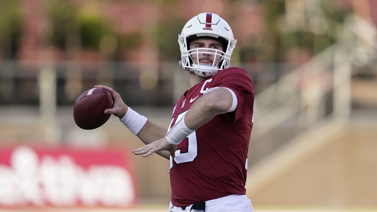 Stanford quarterback Davis Mills throws a warmup pass.