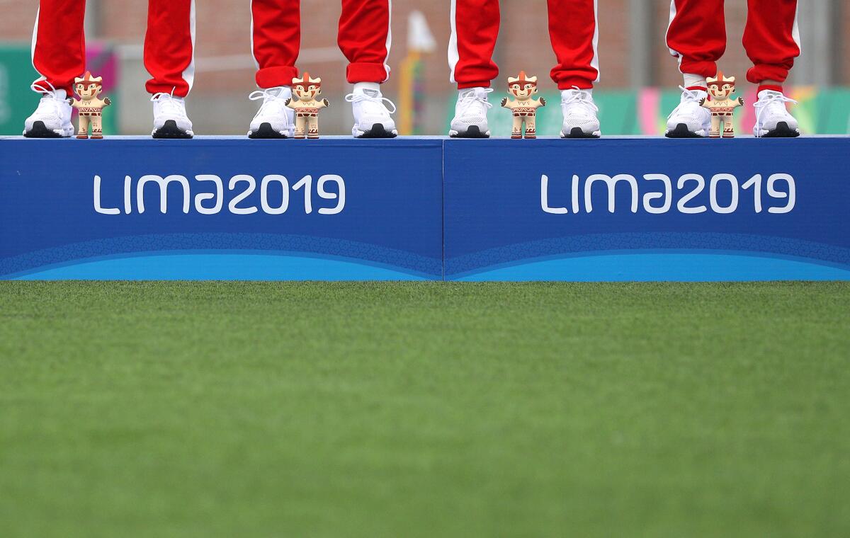 LIMA, PERU - JULY 28: Mascots of the Lima 2019 Pan Americans games are given to gold medalists during the podium of women´s rugby sevens at Rugby Field of Complejo Deportivo Villa Maria del Triunfo on Day 2 of Lima 2019 Pan American Games on July 28, 2019 in Lima, Peru. (Photo by Buda Mendes/Getty Images) ** OUTS - ELSENT, FPG, CM - OUTS * NM, PH, VA if sourced by CT, LA or MoD **