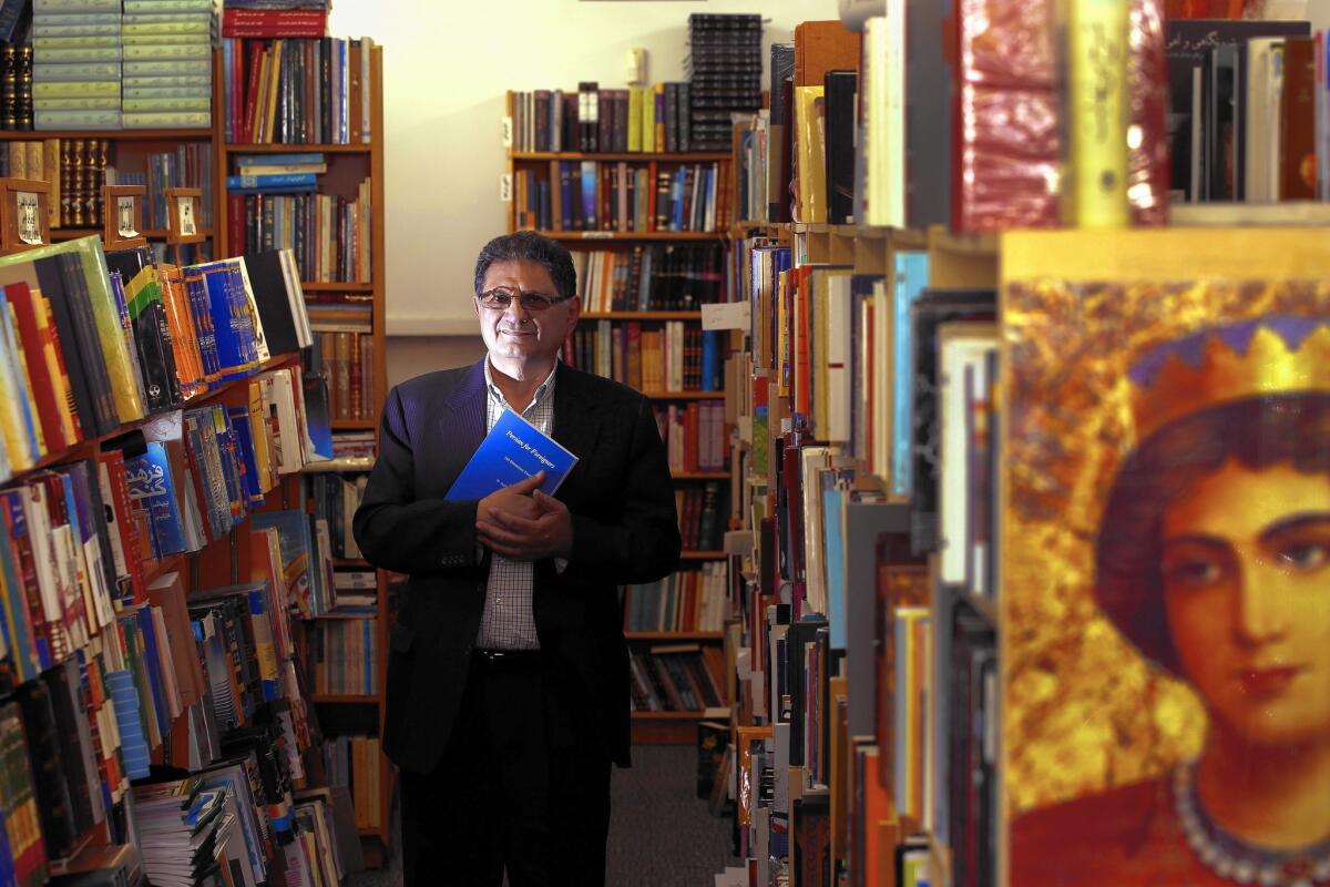 Bijan Khalili, 64, owner of the Ketab Corp. bookstore in Westwood, has a section for books banned in Iran because they promote a “dispassionate look at religion.”
