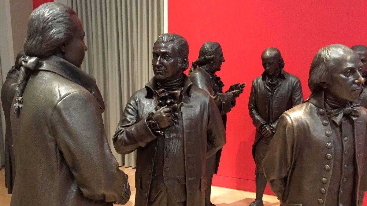 Bronze sculptures of the signers of the U.S. Constitution in the Signers' Hall at the National Constitution Center in Philadelphia.