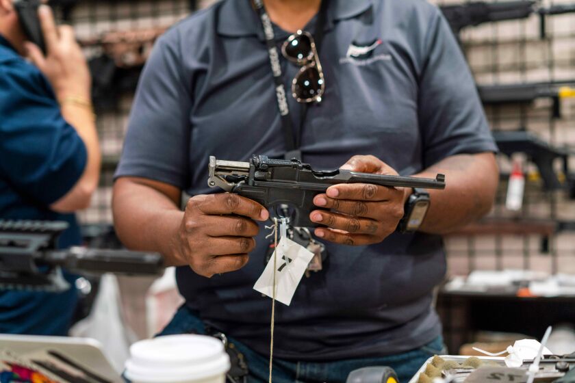 A customer's handgun at Redstone Firearms, in Burbank, California, US, on Friday, Sept. 16, 2022. While White men still represent the largest group of gun owners in the US, women, and specifically Black women, represent a growing share of the market. Photographer: Kyle Grillot/Bloomberg via Getty Images
