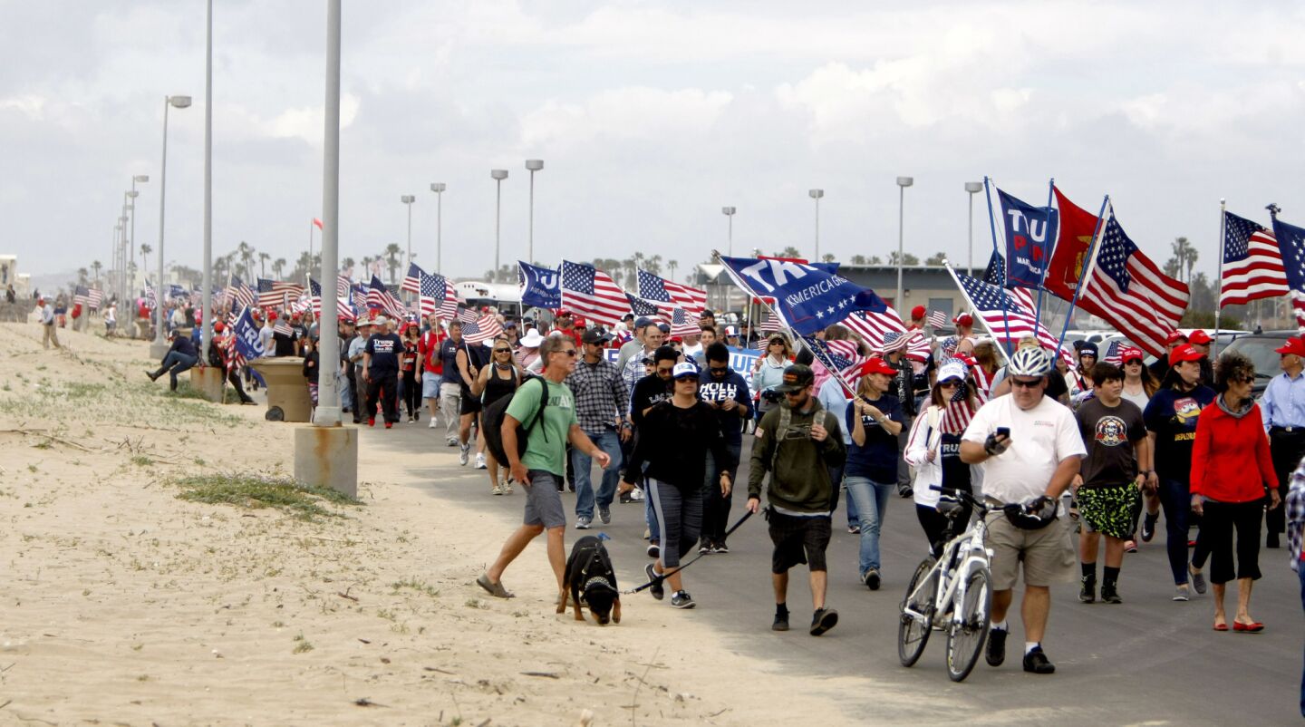 A large crowd came out for the Make America Great Again March at Bolsa Chica State Beach in Huntington Beach on Saturday. The march was in support of President Donald Trump.