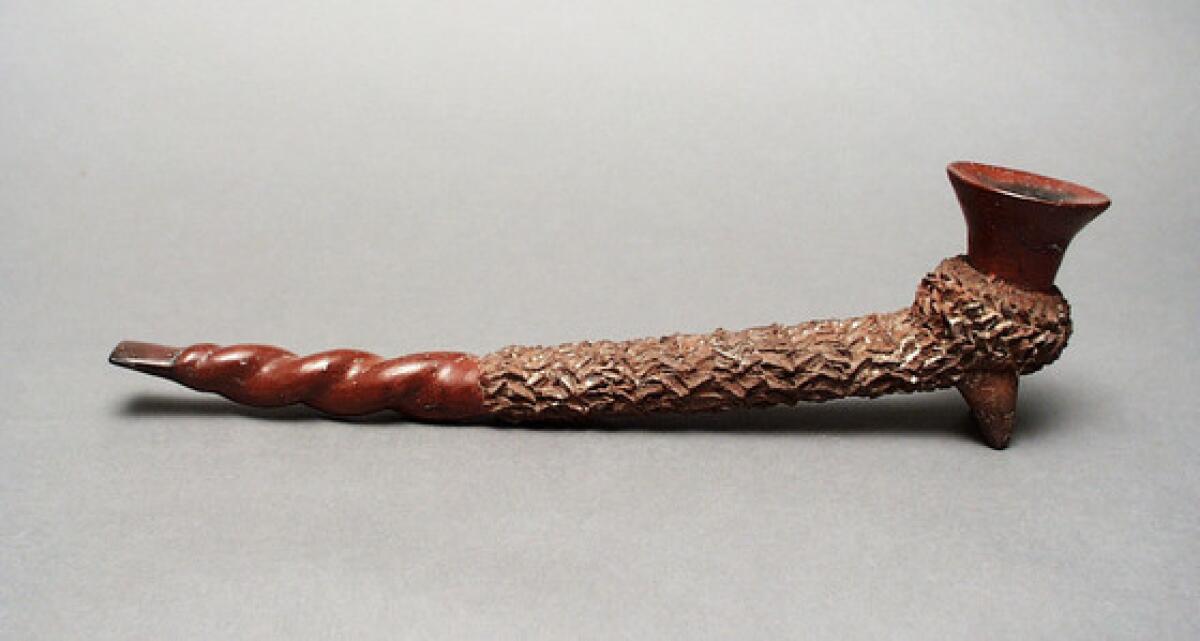 Colima pipe, West Mexico. Its clay is inscribed with geometric designs.