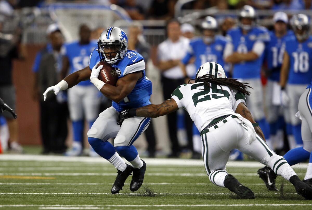 Detroit Lions running back Ameer Abdullah runs against the New York Jets during the first quarter of a preseason game on Thursday.