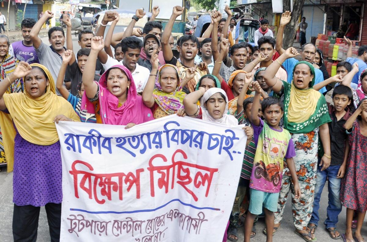 Demonstrators protest Aug. 4 in Khulna, Bangladesh, against the brutal killing of a 12-year-old boy.