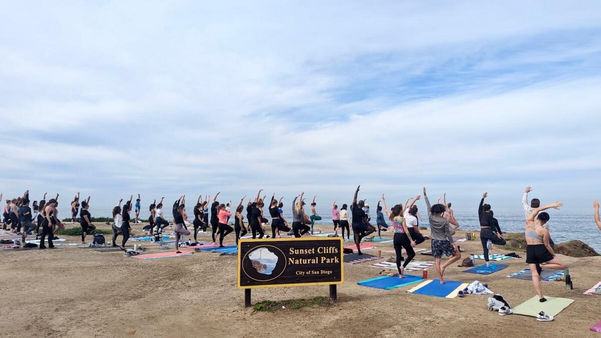 A yoga class led by Amy Baack at Sunset Cliffs Natural Park in San Diego in February.