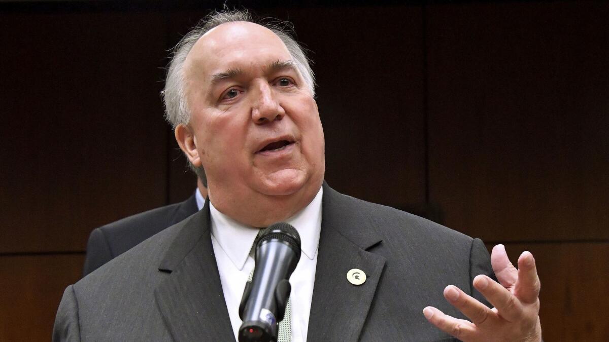 John Engler reportedly has stepped down as Michigan State's interim president.