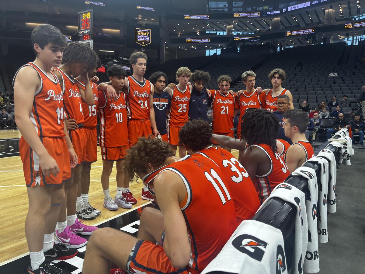 Pacifica Christian players try to regroup during the Division II state championship loss to San Joaquin Memorial.