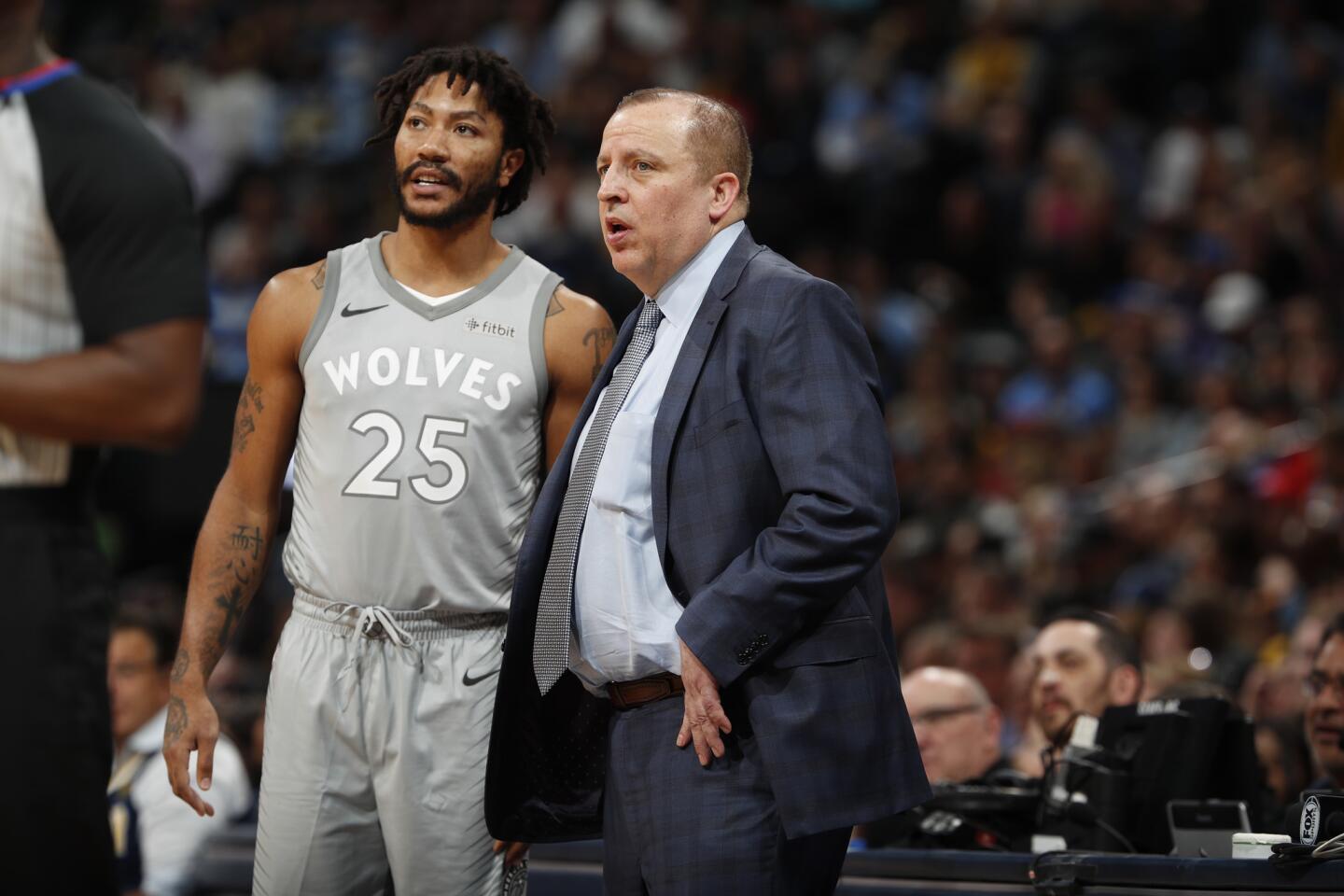 Derrick Rose with Timberwolves coach Tom Thibodeau in the second half of a game againt the Nuggets on April 5, 2018.