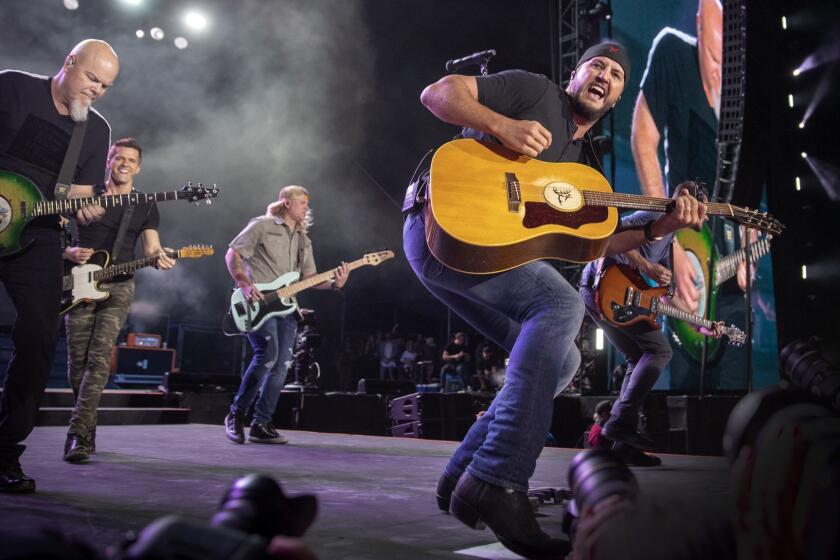 INDIO, CALIF. -- FRIDAY, APRIL 26, 2019: Luke Bryan and his band performs on the Mane Stage as he headlines the first of the three-day 2019 Stagecoach Country Music Festival, the world?s biggest country music festival, at the Empire Polo Fields in Indio, Calif., on April 26, 2019. Stagecoach fans have the chance to watch some 75 performers and DJs over three days. (Allen J. Schaben / Los Angeles Times)
