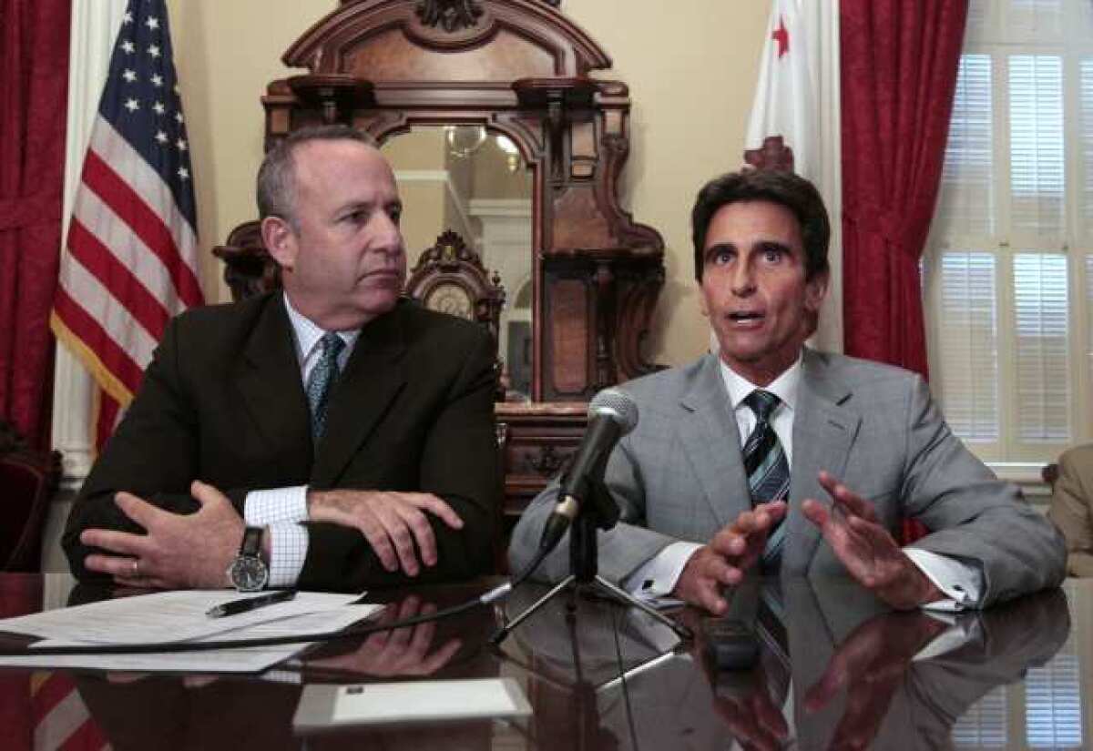 Senate Budget Chairman Mark Leno (D-San Francisco), right, discusses the state budget with Senate leader Darrell Steinberg (D-Sacramento) last year.