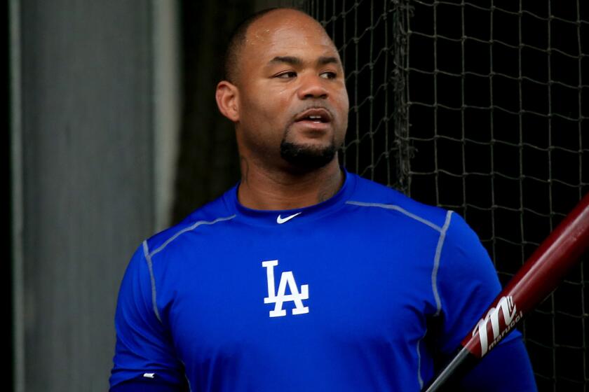 Dodgers outfielder Carl Crawford takes batting practice during spring training in Phoenix on March 2.