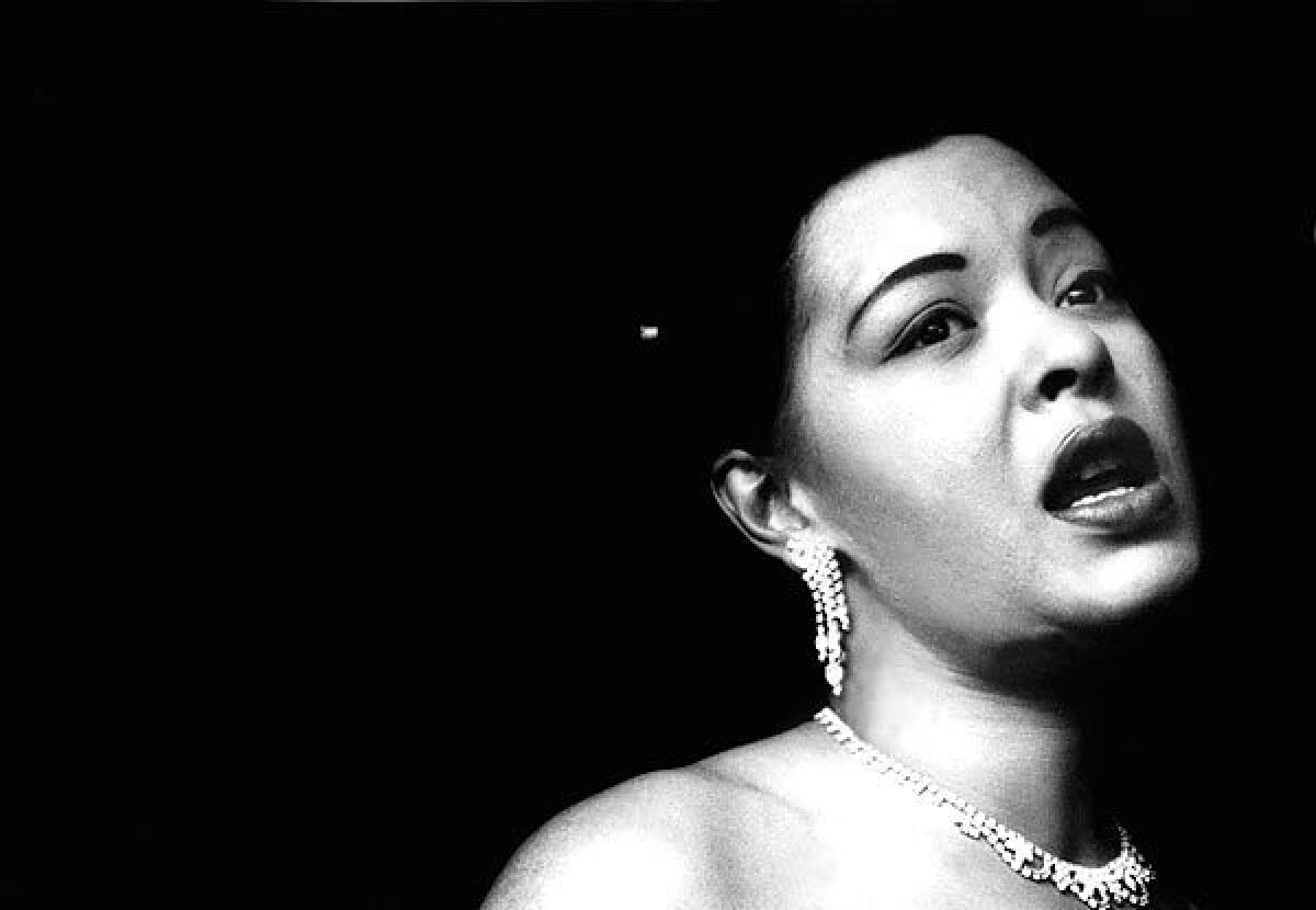 Billie Holiday sings.