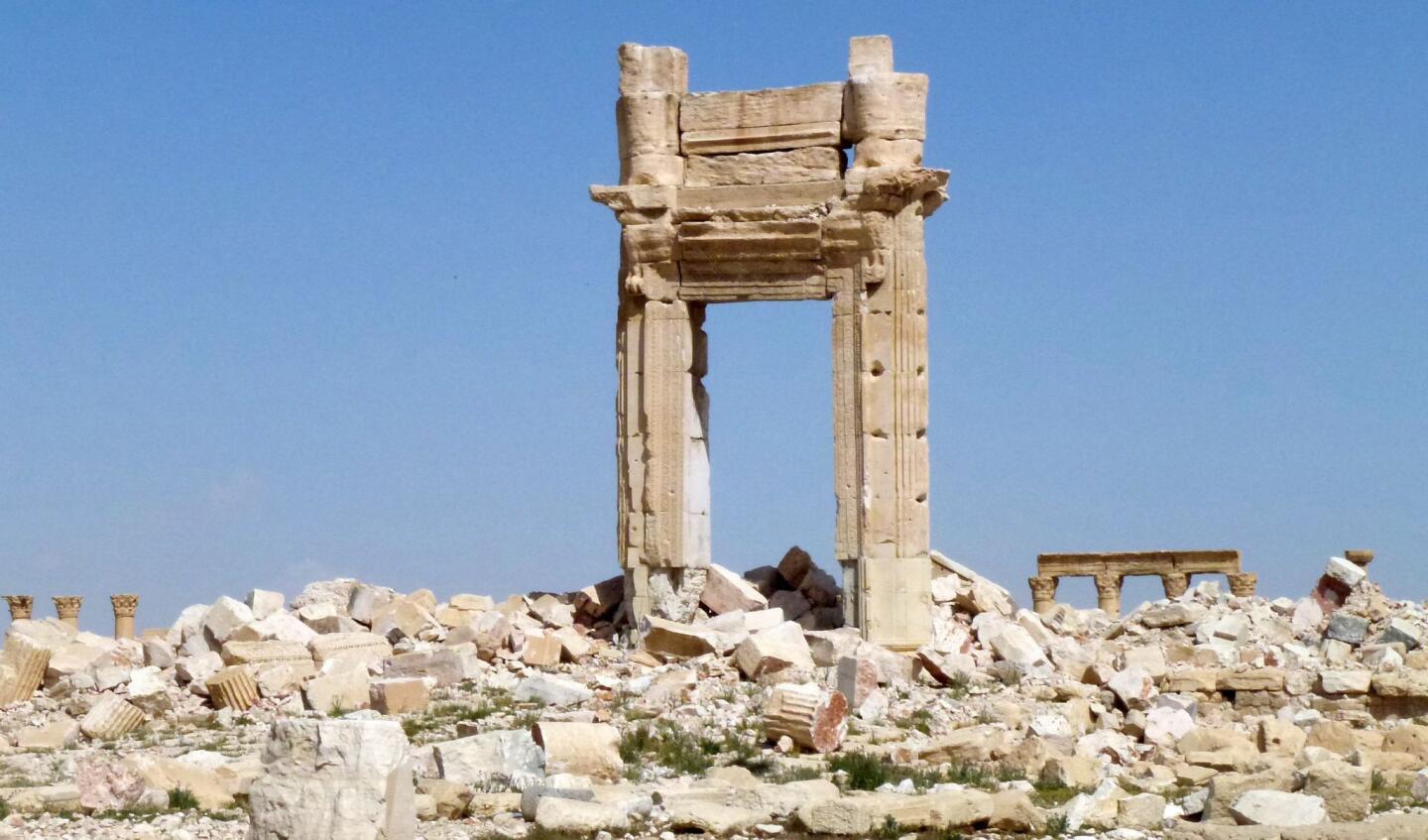 A general view shows the remains of the entrance to the iconic Temple of Bel that was destroyed by Islamic State group jihadists in September 2015 in the ancient city of Palmyra after government troops recaptured the UNESCO world heritage site from the IS group on March 27, 2016.