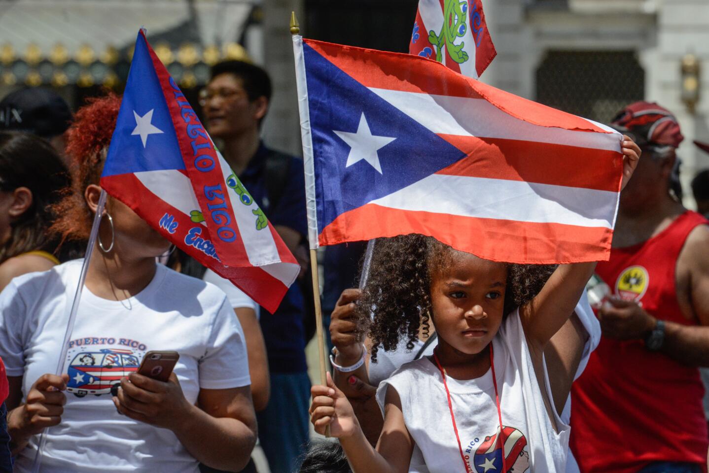 People march up Fifth Avenue in New York in the annual Puerto Rican Day Parade.