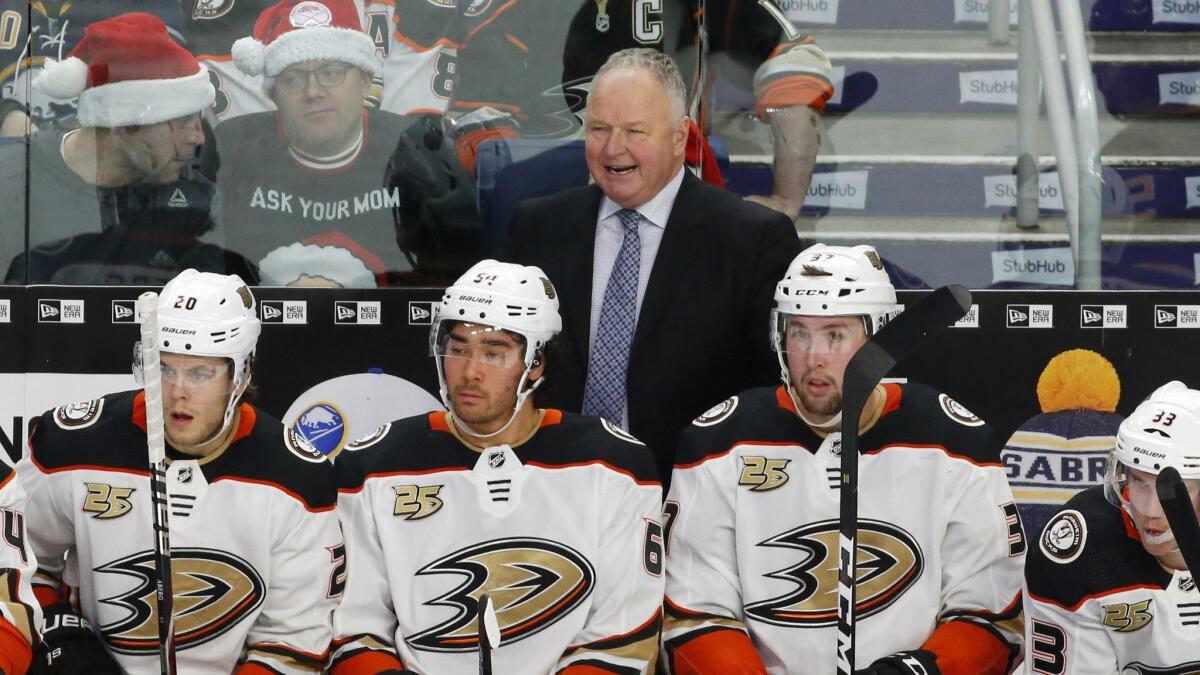 Ducks head coach Randy Carlyle yells to players during the first period against the Buffalo Sabres on Dec. 22, 2018, in Buffalo N.Y.