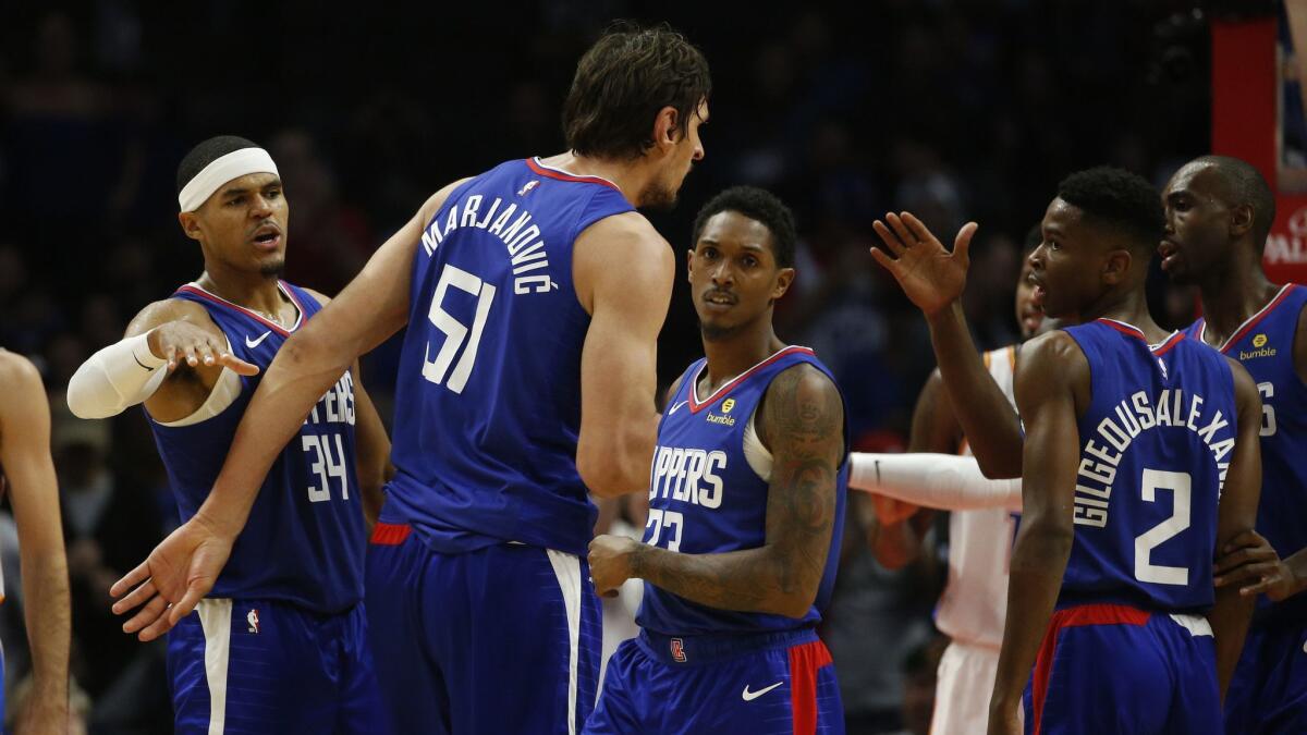 Clippers celebrate during a game against Oklahoma City Thunder.