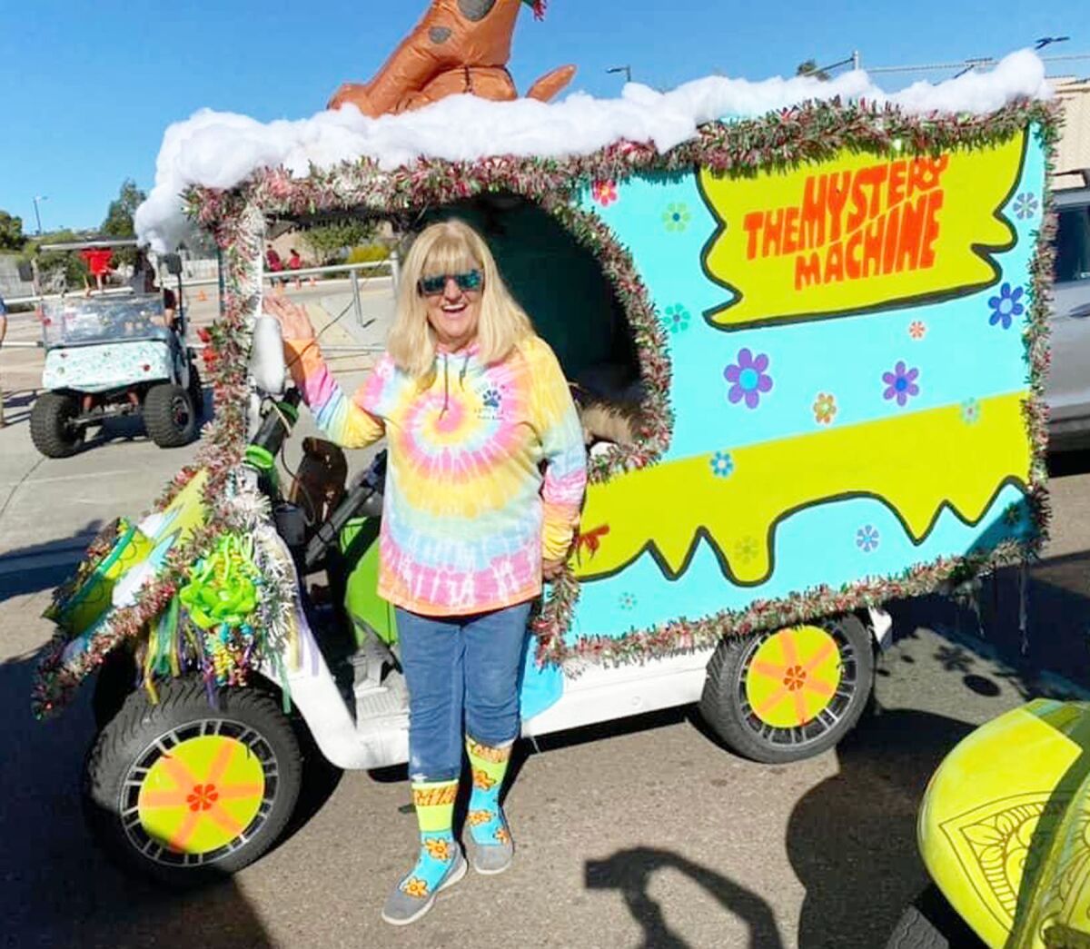 Pamela Jane Taylor decorated her cart as The Mystery Machine from “Scooby-Doo” for the 2021 PB Holiday Parade.