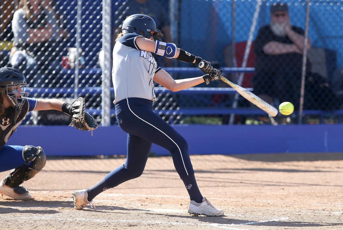 Newport Harbor High's Eliana Gottlieb singles in a Wave League game at Fountain Valley on Wednesday.