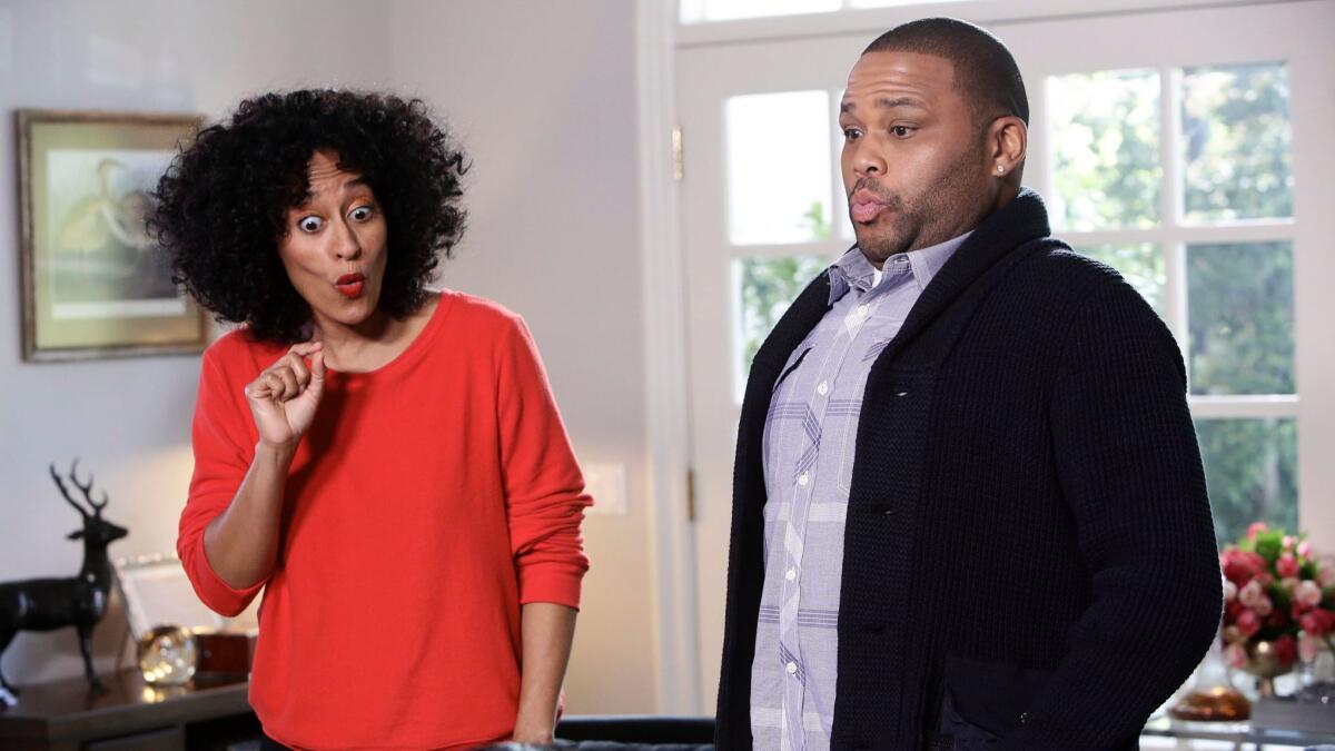 Tracee Ellis Ross and Anthony Anderson appear in a scene from "black-ish." (Nicole Wilder / Associated Press)