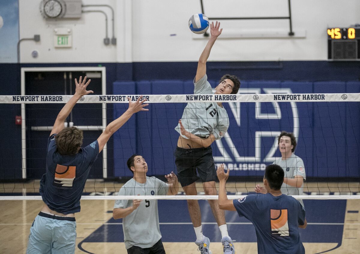 Newport Harbor's Lukas Johnson hits during the Orange County All-Star boys' volleyball match on Tuesday.