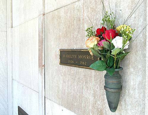 Marilyn Monroe's grave at the Westwood Village Memorial Park and Mortuary in Westwood, Calif. The actress, famous for such films as "The Seven-Year Itch" and "Some Like It Hot," was found dead on Aug. 5, 1962 in her Brentwood, Calif. home. Playboy founder Hugh Hefner later bought the crypt next to hers.