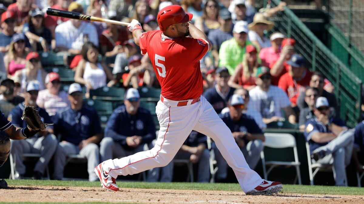 Angels slugger Albert Pujols bats during a spring training game against the San Diego Padres on Friday in Tempe, Ariz.