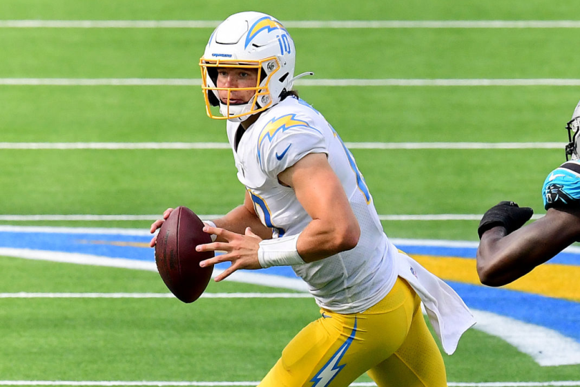 INGLEWOOD, CALIFORNIA - SEPTEMBER 27: Justin Herbert #10 of the Los Angeles Chargers rolls out.