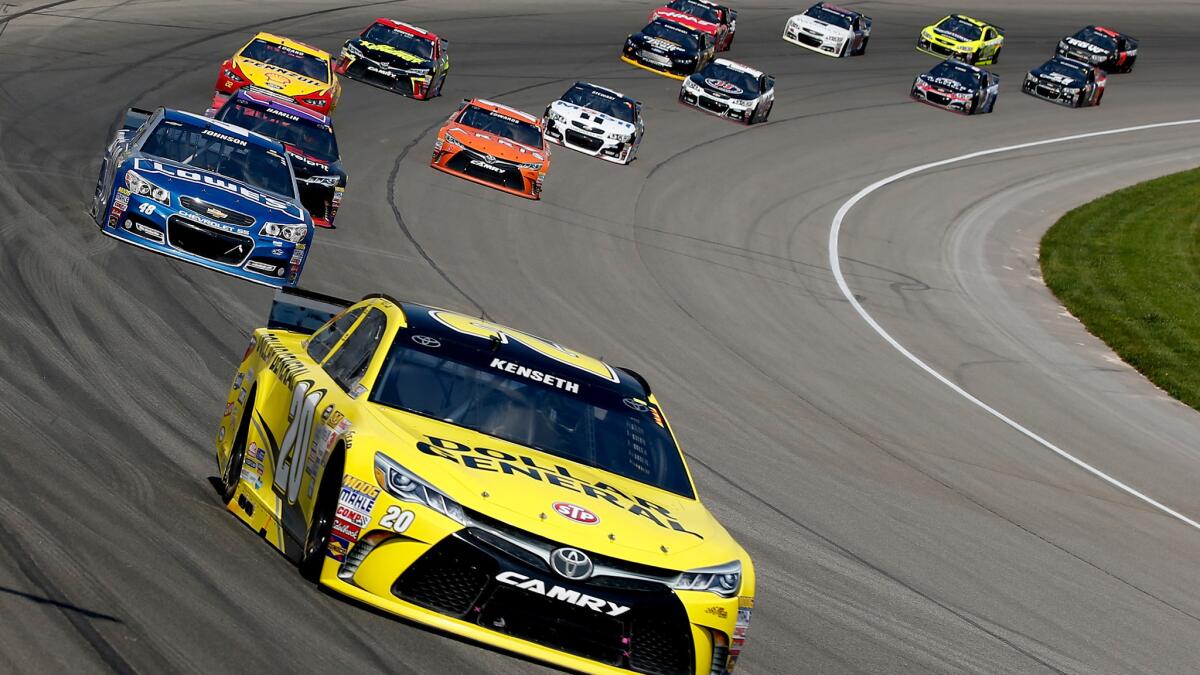 NASCAR driver Matt Kenseth leads the field during the Sprint Cup Series Pure Michigan 400 on Sunday at Michigan International Speedway.