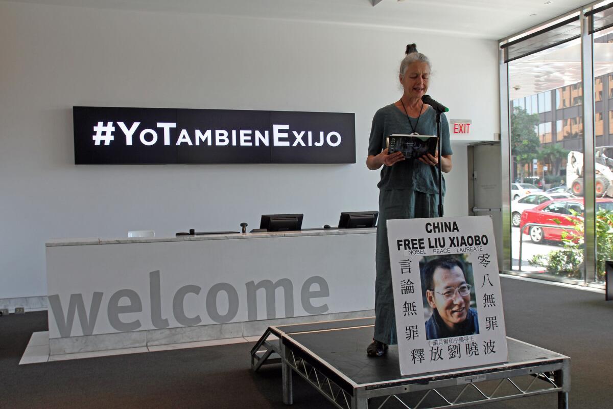 On Monday, the Hammer Museum re-staged "Tatlin's Whisper #6," a work of performance about free expression in honor of Cuban artist Tania Bruguera. Here, a participant speaks in honor of jailed Nobel Prize recipient Liu Xiaobo.