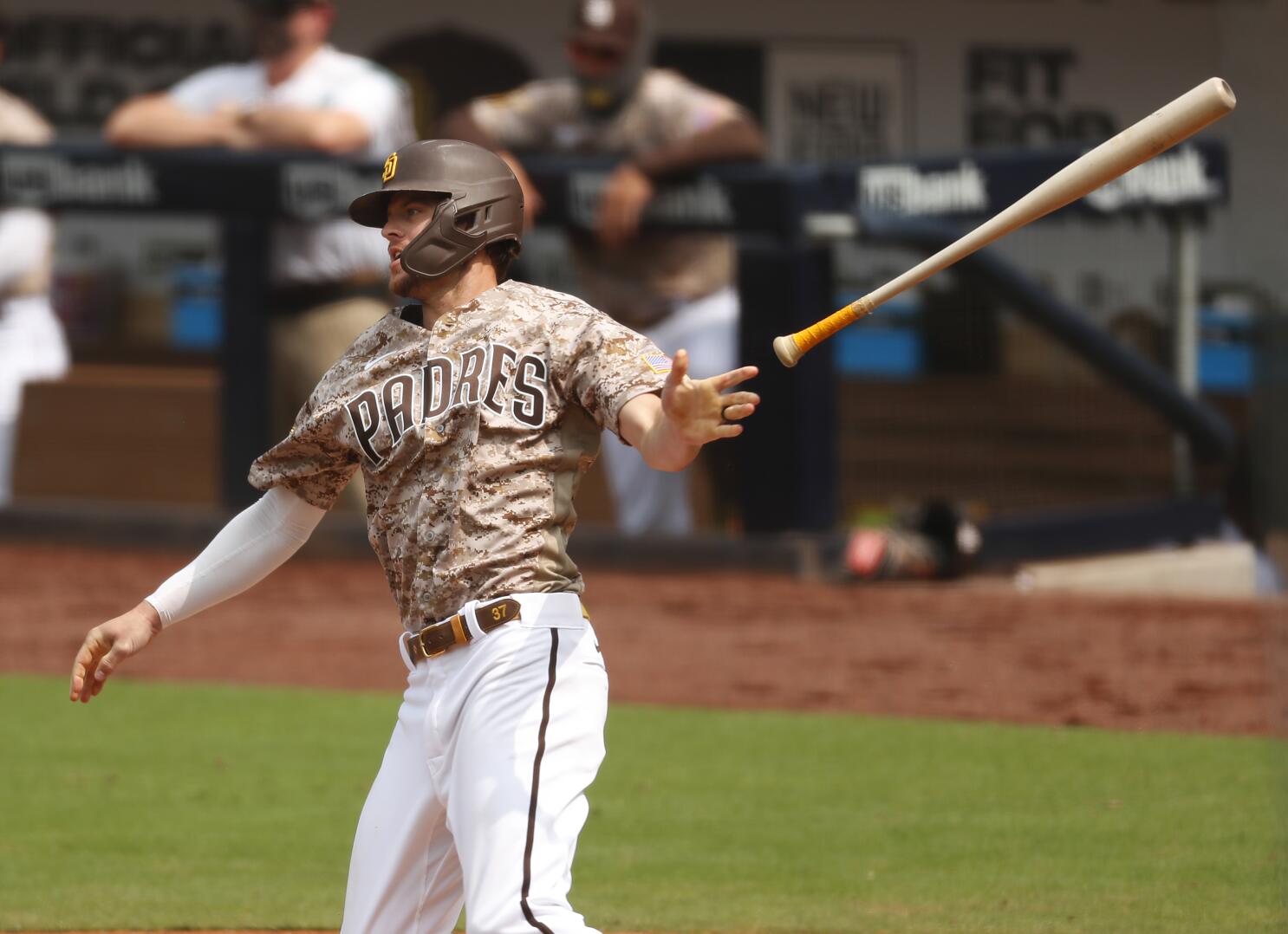 San Francisco Giants' Wilmer Flores hits a three-run home run against the  the San Diego Padres during the sixth inning of the second game of a  baseball doubleheader Friday, Sept. 25, 2020