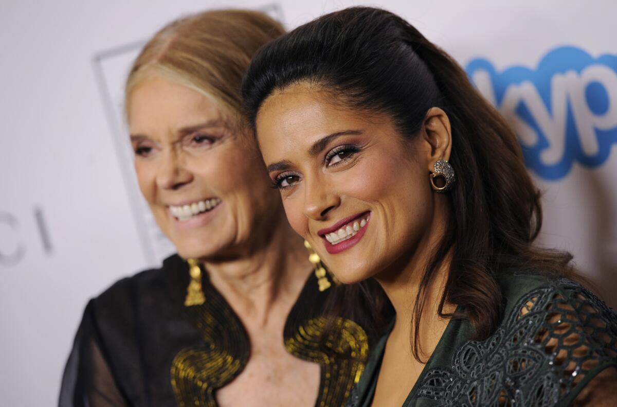 Honorees Salma Hayek Pinault, right, and Gloria Steinem at Equality Now's "Make Equality Reality" event at the Montage Hotel on Monday.