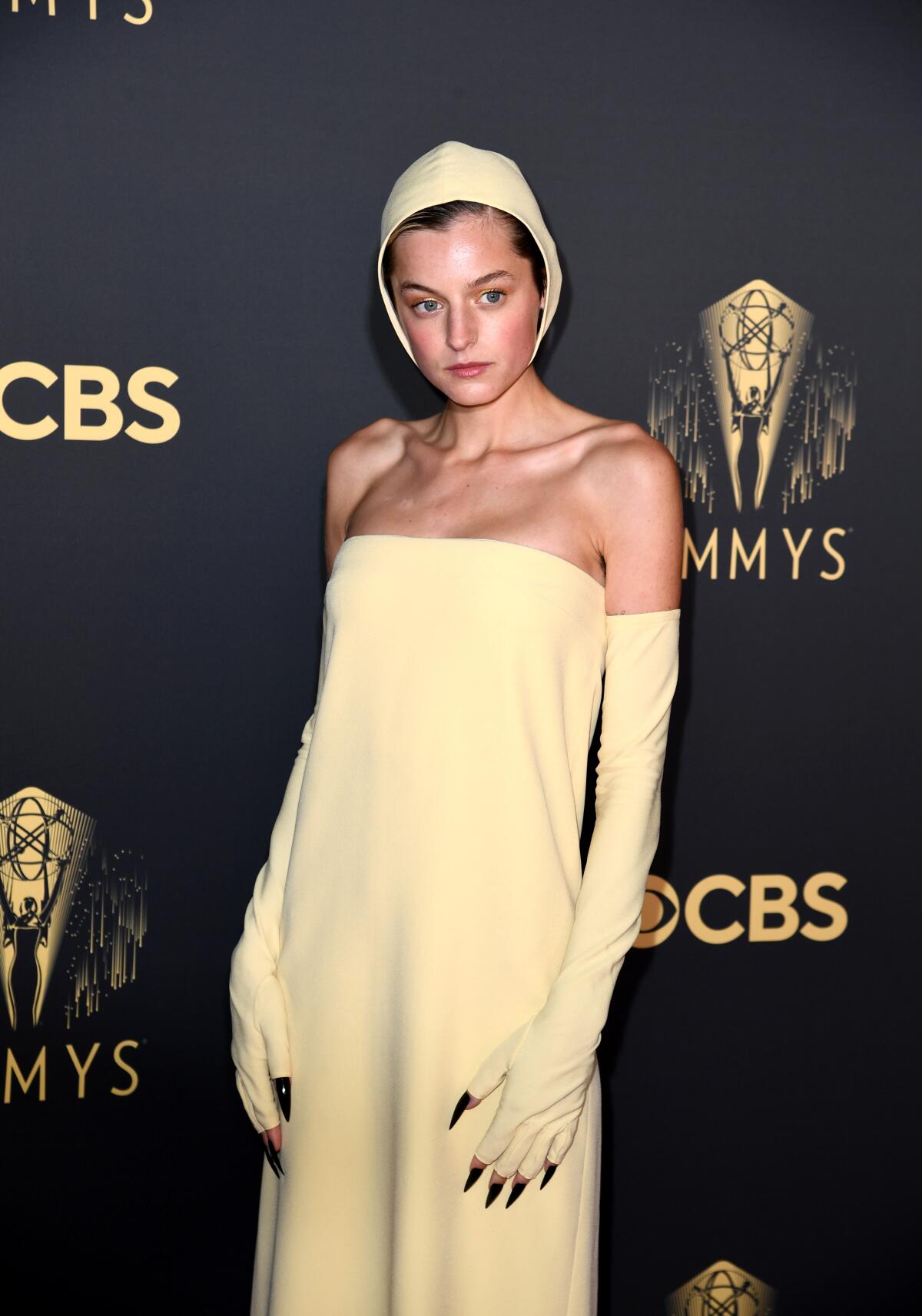 Emma Corrin attends the Emmys celebration in London.