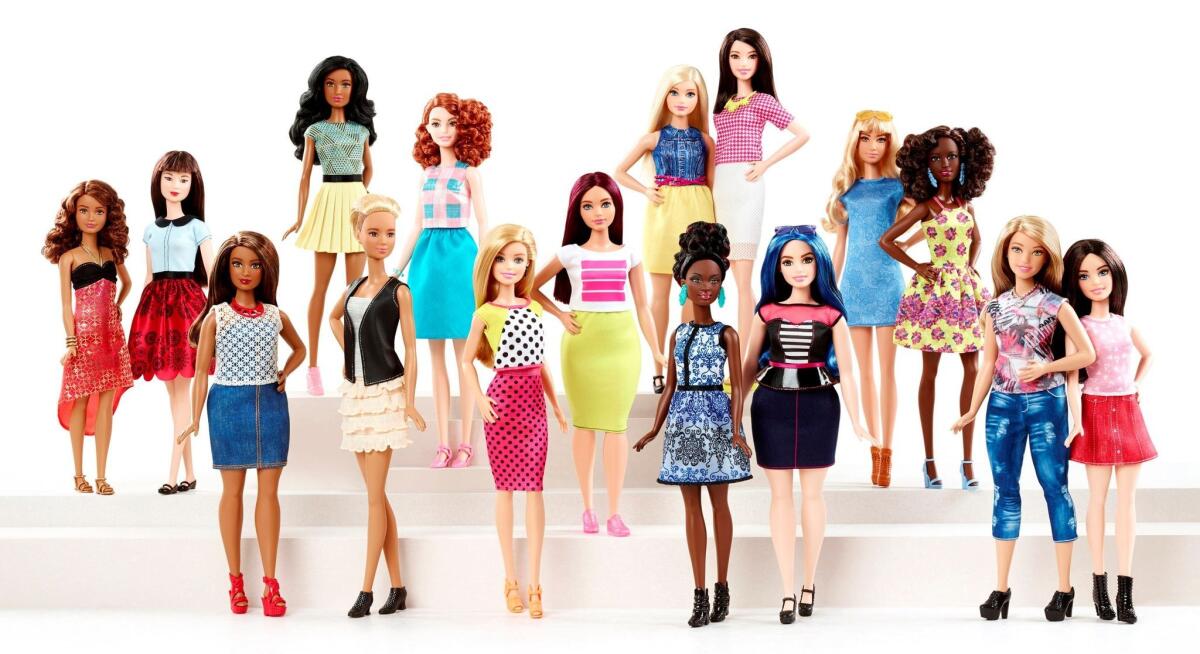 New Barbie dolls stand alongside older models in this Jan. 28 photo.