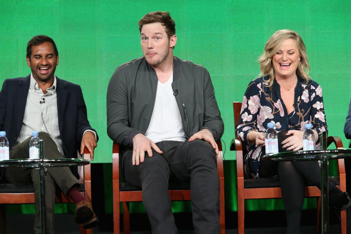 Aziz Ansari, left, Chris Pratt and Amy Poehler during the "Parks and Recreation" panel at the Winter TCA Tour on Jan. 16 in Pasadena.