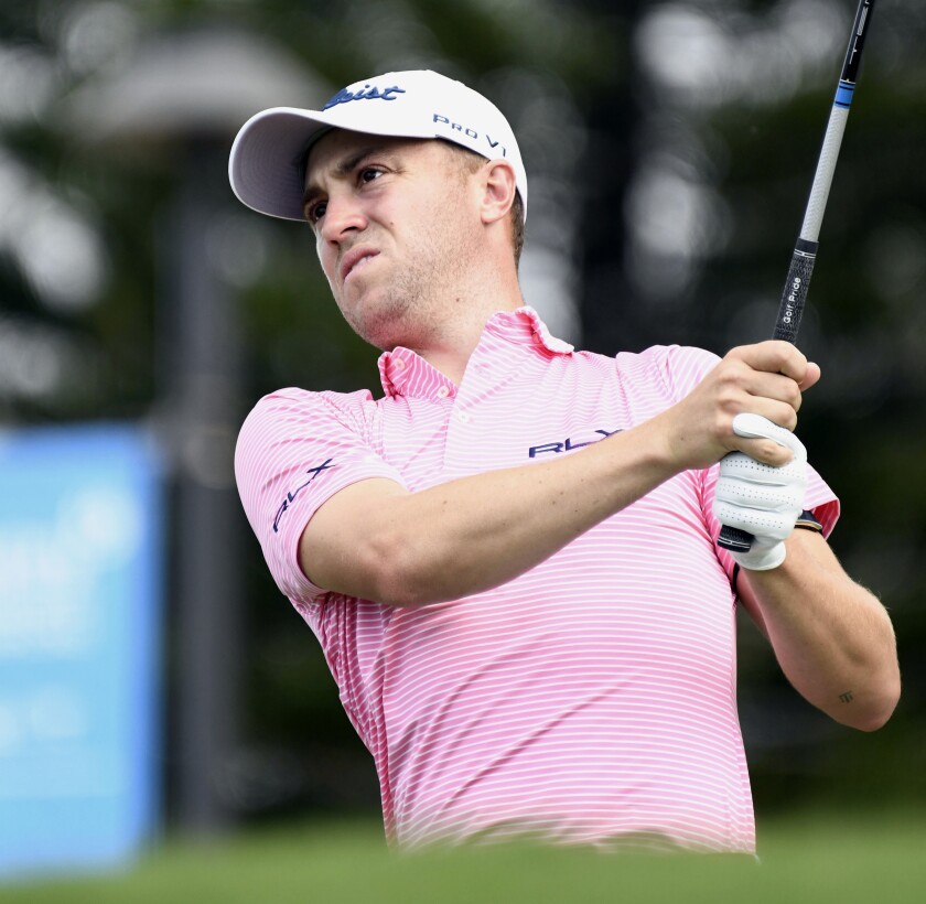 Justin Thomas hits from the first tee during the first round of the Tournament of Champions golf event, Thursday, Jan. 7, 2021, at Kapalua Plantation Course in Kapalua, Hawaii. (Matthew Thayer/The News via AP)