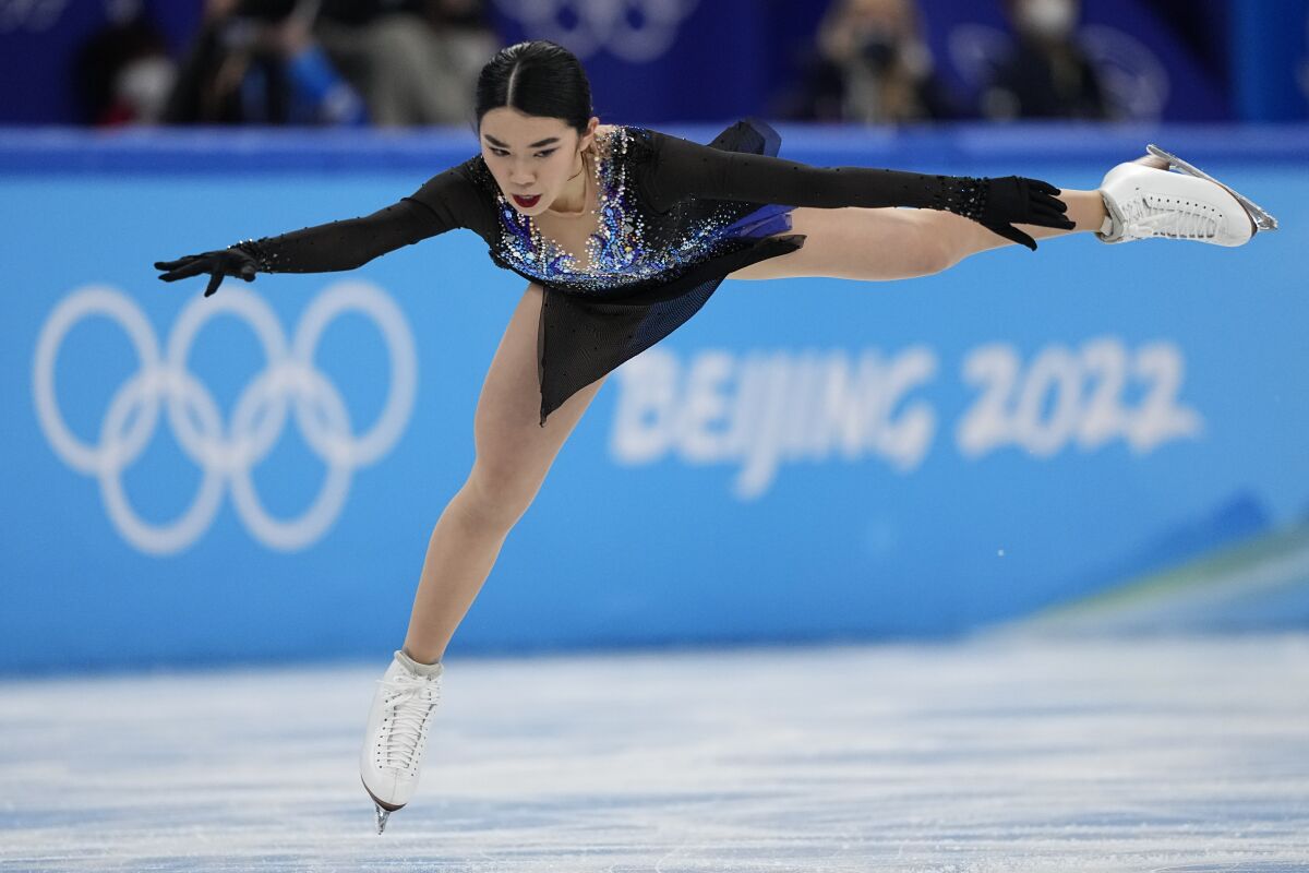Karen Chen, of the United States, competes in the women's short program during the figure skating at the 2022 Winter Olympics, Tuesday, Feb. 15, 2022, in Beijing. (AP Photo/David J. Phillip)