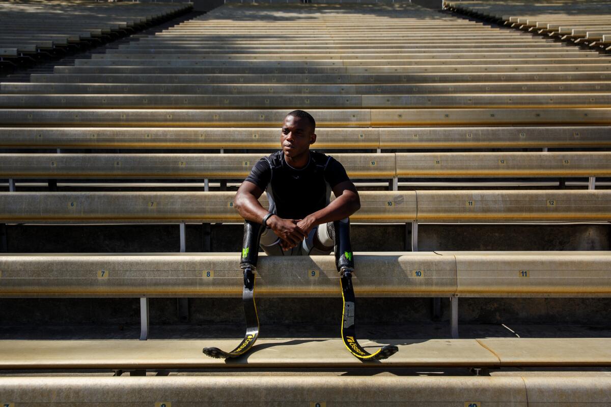 Paralympic sprinter Blake Leeper sits in the stands at the UCLA Drake Track Stadium on Feb. 26.