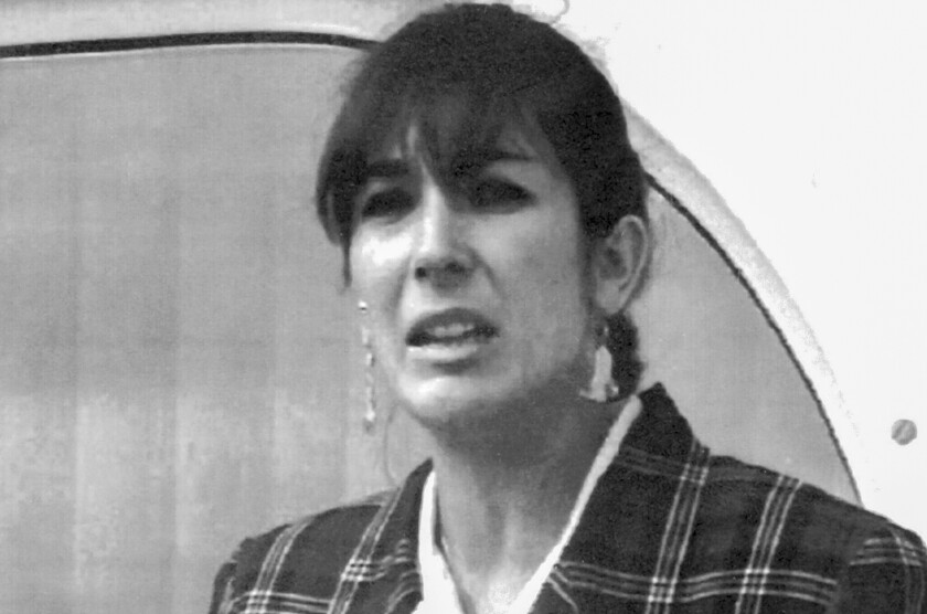 FILE - Ghislaine Maxwell, daughter of late British publisher Robert Maxwell, reads a statement expressing her family's gratitude to Spanish authorities after recovery of his body, in Nov. 7, 1991, in Tenerife, Spain. Maxwell should spend at least 30 years in prison for her role in the sexual abuse of teenage girls over a 10-year period by her onetime boyfriend, financier Jeffrey Epstein, prosecutors said Wednesday, June 23, 2022, in written arguments. (AP Photo/Dominique Mollard, File)